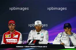 The post race FIA Press Conference (L to R): Sebastian Vettel (GER) Ferrari, second; Lewis Hamilton (GBR) Mercedes AMG F1, race winner; Felipe Massa (BRA) Williams, third. 06.09.2015. Formula 1 World Championship, Rd 12, Italian Grand Prix, Monza, Italy, Race Day.