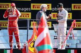 The podium (L to R): Sebastian Vettel (GER) Ferrari, second; George Lucas (USA) Star Wars Creator; Lewis Hamilton (GBR) Mercedes AMG F1, race winner. 06.09.2015. Formula 1 World Championship, Rd 12, Italian Grand Prix, Monza, Italy, Race Day.