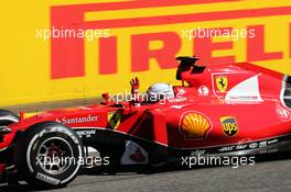 Second placed Sebastian Vettel (GER) Ferrari SF15-T celebrates at the end of the race. 06.09.2015. Formula 1 World Championship, Rd 12, Italian Grand Prix, Monza, Italy, Race Day.