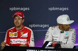 (L to R): Sebastian Vettel (GER) Ferrari and Lewis Hamilton (GBR) Mercedes AMG F1 in the FIA Press Conference. 06.09.2015. Formula 1 World Championship, Rd 12, Italian Grand Prix, Monza, Italy, Race Day.