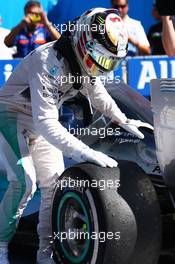 Race winner Lewis Hamilton (GBR) Mercedes AMG F1 celebrates in parc ferme. 06.09.2015. Formula 1 World Championship, Rd 12, Italian Grand Prix, Monza, Italy, Race Day.