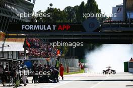Daniil Kvyat (RUS) Red Bull Racing RB11 locks up under braking entering the pit lane. 06.09.2015. Formula 1 World Championship, Rd 12, Italian Grand Prix, Monza, Italy, Race Day.