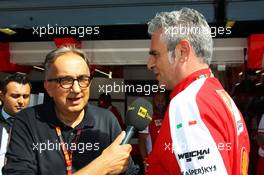 (L to R): Sergio Marchionne (ITA), Ferrari President and CEO of Fiat Chrysler Automobiles with Maurizio Arrivabene (ITA) Ferrari Team Principal. 05.09.2015. Formula 1 World Championship, Rd 12, Italian Grand Prix, Monza, Italy, Qualifying Day.