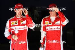 (L to R): Kimi Raikkonen (FIN) Ferrari with Sebastian Vettel (GER) Ferrari in qualifying parc ferme. 05.09.2015. Formula 1 World Championship, Rd 12, Italian Grand Prix, Monza, Italy, Qualifying Day.