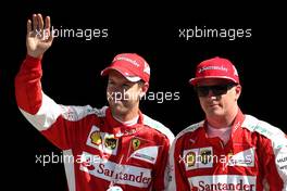 Sebastian Vettel (GER), Scuderia Ferrari and Kimi Raikkonen (FIN), Scuderia Ferrari  05.09.2015. Formula 1 World Championship, Rd 12, Italian Grand Prix, Monza, Italy, Qualifying Day.