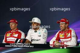 The post qualifying FIA Press Conference (L to R): Kimi Raikkonen (FIN) Ferrari; Lewis Hamilton (GBR) Mercedes AMG F1; Sebastian Vettel (GER) Ferrari. 05.09.2015. Formula 1 World Championship, Rd 12, Italian Grand Prix, Monza, Italy, Qualifying Day.