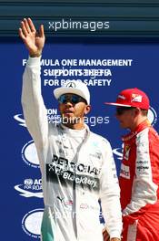 Lewis Hamilton (GBR) Mercedes AMG F1 celebrates his pole position in parc ferme. 05.09.2015. Formula 1 World Championship, Rd 12, Italian Grand Prix, Monza, Italy, Qualifying Day.