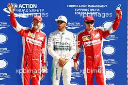 Qualifying top three in parc ferme (L to R): Sebastian Vettel (GER) Ferrari, third; Lewis Hamilton (GBR) Mercedes AMG F1, pole position; Kimi Raikkonen (FIN) Ferrari, second. 05.09.2015. Formula 1 World Championship, Rd 12, Italian Grand Prix, Monza, Italy, Qualifying Day.