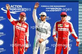 Qualifying top three in parc ferme (L to R): Sebastian Vettel (GER) Ferrari, third; Lewis Hamilton (GBR) Mercedes AMG F1, pole position; Kimi Raikkonen (FIN) Ferrari, second. 05.09.2015. Formula 1 World Championship, Rd 12, Italian Grand Prix, Monza, Italy, Qualifying Day.