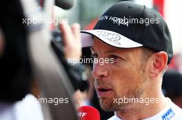 Jenson Button (GBR) McLaren with the media. 05.09.2015. Formula 1 World Championship, Rd 12, Italian Grand Prix, Monza, Italy, Qualifying Day.