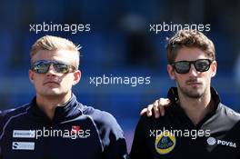 (L to R): Marcus Ericsson (SWE) Sauber F1 Team and Romain Grosjean (FRA) Lotus F1 Team on the drivers parade observe a minute's silence for Justin Wilson. 06.09.2015. Formula 1 World Championship, Rd 12, Italian Grand Prix, Monza, Italy, Race Day.