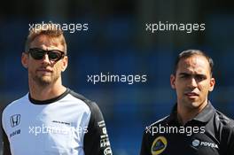 (L to R): Jenson Button (GBR) McLaren and Pastor Maldonado (VEN) Lotus F1 Team on the drivers parade observe a minute's silence for Justin Wilson. 06.09.2015. Formula 1 World Championship, Rd 12, Italian Grand Prix, Monza, Italy, Race Day.