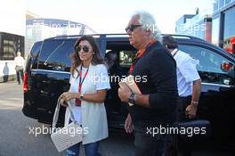 (L to R): Fabiana Flosi (BRA), wife of Bernie Ecclestone (GBR), with Flavio Briatore (ITA). 06.09.2015. Formula 1 World Championship, Rd 12, Italian Grand Prix, Monza, Italy, Race Day.