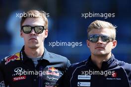 (L to R): Daniil Kvyat (RUS) Red Bull Racing and Marcus Ericsson (SWE) Sauber F1 Team on the drivers parade observe a minute's silence for Justin Wilson. 06.09.2015. Formula 1 World Championship, Rd 12, Italian Grand Prix, Monza, Italy, Race Day.