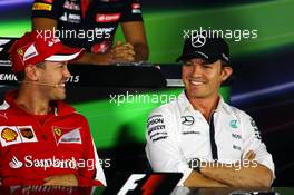 (L to R): Sebastian Vettel (GER) Ferrari and Nico Rosberg (GER) Mercedes AMG F1 in the FIA Press Conference. 03.09.2015. Formula 1 World Championship, Rd 12, Italian Grand Prix, Monza, Italy, Preparation Day.