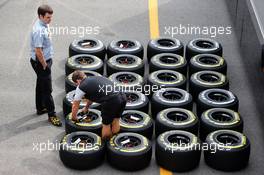 McLaren mechanic with Pirelli tyres. 03.09.2015. Formula 1 World Championship, Rd 12, Italian Grand Prix, Monza, Italy, Preparation Day.