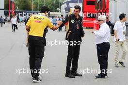 Federico Gastaldi (ARG) Lotus F1 Team Deputy Team Principal (Centre) and Herbie Blash (GBR) FIA Delegate with a Renault Sport F1 employee. 03.09.2015. Formula 1 World Championship, Rd 12, Italian Grand Prix, Monza, Italy, Preparation Day.
