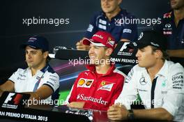 (L to R): Felipe Massa (BRA) Williams; Sebastian Vettel (GER) Ferrari; and Nico Rosberg (GER) Mercedes AMG F1 in the FIA Press Conference. 03.09.2015. Formula 1 World Championship, Rd 12, Italian Grand Prix, Monza, Italy, Preparation Day.