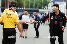 Federico Gastaldi (ARG) Lotus F1 Team Deputy Team Principal (Centre) and Herbie Blash (GBR) FIA Delegate with a Renault Sport F1 employee. 03.09.2015. Formula 1 World Championship, Rd 12, Italian Grand Prix, Monza, Italy, Preparation Day.
