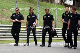 Romain Grosjean (FRA) Lotus F1 Team walks the circuit with Jolyon Palmer (GBR) Lotus F1 Team Test and Reserve Driver and the team. 03.09.2015. Formula 1 World Championship, Rd 12, Italian Grand Prix, Monza, Italy, Preparation Day.