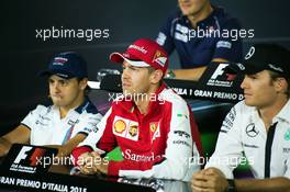 (L to R): Felipe Massa (BRA) Williams; Sebastian Vettel (GER) Ferrari; and Nico Rosberg (GER) Mercedes AMG F1 in the FIA Press Conference. 03.09.2015. Formula 1 World Championship, Rd 12, Italian Grand Prix, Monza, Italy, Preparation Day.