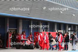Sebastian Vettel (GER) Ferrari SF15-T heads behind the covers in the pits. 02.02.2015. Formula One Testing, Day Two, Jerez, Spain.