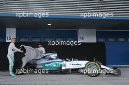 (L to R): Nico Rosberg (GER) Mercedes AMG F1 and team mate Lewis Hamilton (GBR) Mercedes AMG F1 unveil the Mercedes AMG F1 W06. 01.02.2015. Formula One Testing, Day One, Jerez, Spain.