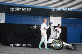 (L to R): Nico Rosberg (GER) Mercedes AMG F1 and team mate Lewis Hamilton (GBR) Mercedes AMG F1 unveil the Mercedes AMG F1 W06. 01.02.2015. Formula One Testing, Day One, Jerez, Spain.