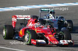 Kimi Raikkonen (FIN) Ferrari SF15-T leads Lewis Hamilton (GBR) Mercedes AMG F1 W06. 04.02.2015. Formula One Testing, Day Four, Jerez, Spain.