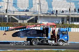 The Red Bull Racing RB11 of Daniel Ricciardo (AUS) Red Bull Racing is recovered back to the pits on the back of a truck. 04.02.2015. Formula One Testing, Day Four, Jerez, Spain.