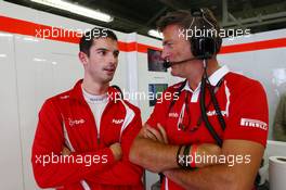 (L to R): Alexander Rossi (USA) Manor Marussia F1 Team with Graeme Lowdon (GBR) Manor Marussia F1 Team Chief Executive Officer. 25.09.2015. Formula 1 World Championship, Rd 14, Japanese Grand Prix, Suzuka, Japan, Practice Day.