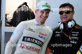Nico Hulkenberg (GER) Sahara Force India F1 with Bradley Joyce (GBR) Sahara Force India F1 Race Engineer. 27.09.2015. Formula 1 World Championship, Rd 14, Japanese Grand Prix, Suzuka, Japan, Race Day.