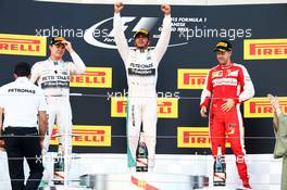 The podium (L to R): Nico Rosberg (GER) Mercedes AMG F1, second; Lewis Hamilton (GBR) Mercedes AMG F1, race winner; Sebastian Vettel (GER) Ferrari, race winner. 27.09.2015. Formula 1 World Championship, Rd 14, Japanese Grand Prix, Suzuka, Japan, Race Day.