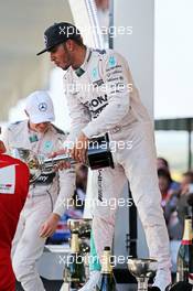 Race winner Lewis Hamilton (GBR) Mercedes AMG F1 celebrates on the podium. 27.09.2015. Formula 1 World Championship, Rd 14, Japanese Grand Prix, Suzuka, Japan, Race Day.