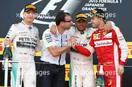 1st place Lewis Hamilton (GBR) Mercedes AMG F1 W06, 2nd place Nico Rosberg (GER) Mercedes AMG F1 and 3rd place Sebastian Vettel (GER) Ferrari SF15-T. 27.09.2015. Formula 1 World Championship, Rd 14, Japanese Grand Prix, Suzuka, Japan, Race Day.