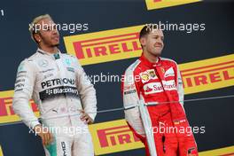Lewis Hamilton (GBR), Mercedes AMG F1 Team and Sebastian Vettel (GER), Scuderia Ferrari  27.09.2015. Formula 1 World Championship, Rd 14, Japanese Grand Prix, Suzuka, Japan, Race Day.