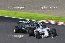 Valtteri Bottas (FIN) Williams FW37 leads Nico Rosberg (GER) Mercedes AMG F1 W06. 27.09.2015. Formula 1 World Championship, Rd 14, Japanese Grand Prix, Suzuka, Japan, Race Day.