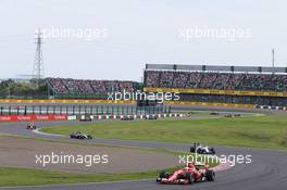 Sebastian Vettel (GER) Ferrari SF15-T. 27.09.2015. Formula 1 World Championship, Rd 14, Japanese Grand Prix, Suzuka, Japan, Race Day.