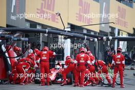 Sebastian Vettel (GER) Ferrari SF15-T makes a pit stop. 27.09.2015. Formula 1 World Championship, Rd 14, Japanese Grand Prix, Suzuka, Japan, Race Day.