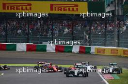 Lewis Hamilton (GBR) Mercedes AMG F1 W06 leads at the start of the race. 27.09.2015. Formula 1 World Championship, Rd 14, Japanese Grand Prix, Suzuka, Japan, Race Day.