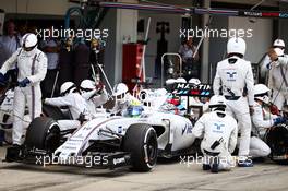 Felipe Massa (BRA) Williams FW37 makes a pit stop. 27.09.2015. Formula 1 World Championship, Rd 14, Japanese Grand Prix, Suzuka, Japan, Race Day.