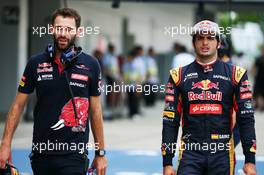 Carlos Sainz Jr (ESP) Scuderia Toro Rosso with Sam Village (GBR) Scuderia Toro Rosso (Left). 26.09.2015. Formula 1 World Championship, Rd 14, Japanese Grand Prix, Suzuka, Japan, Qualifying Day.