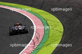 Daniel Ricciardo (AUS) Red Bull Racing RB11 sends sparks flying. 26.09.2015. Formula 1 World Championship, Rd 14, Japanese Grand Prix, Suzuka, Japan, Qualifying Day.