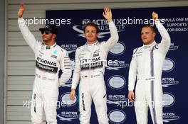 Qualifying top three in parc ferme (L to R): Lewis Hamilton (GBR) Mercedes AMG F1, second; Nico Rosberg (GER) Mercedes AMG F1, pole position; Valtteri Bottas (FIN) Williams, third. 26.09.2015. Formula 1 World Championship, Rd 14, Japanese Grand Prix, Suzuka, Japan, Qualifying Day.