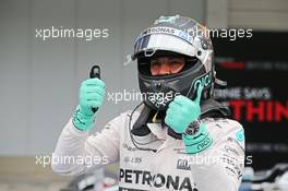 Nico Rosberg (GER) Mercedes AMG F1 celebrates his pole position in parc ferme. 26.09.2015. Formula 1 World Championship, Rd 14, Japanese Grand Prix, Suzuka, Japan, Qualifying Day.