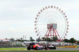 Max Verstappen (NLD) Scuderia Toro Rosso STR10 leads Will Stevens (GBR) Manor Marussia F1 Team. 26.09.2015. Formula 1 World Championship, Rd 14, Japanese Grand Prix, Suzuka, Japan, Qualifying Day.