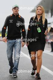 Nico Hulkenberg (GER) Sahara Force India F1 with Victoria Helyar (GBR) Sahara Force India F1 Team. 24.09.2015. Formula 1 World Championship, Rd 14, Japanese Grand Prix, Suzuka, Japan, Preparation Day.