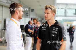 (L to R): James Rossiter (GBR) with Nico Hulkenberg (GER) Sahara Force India F1. 24.09.2015. Formula 1 World Championship, Rd 14, Japanese Grand Prix, Suzuka, Japan, Preparation Day.