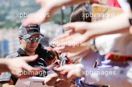 Sergio Perez (MEX) Sahara Force India F1 signs autographs for the fans. 22.05.2015. Formula 1 World Championship, Rd 6, Monaco Grand Prix, Monte Carlo, Monaco, Friday.