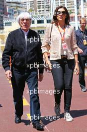 (L to R): Bernie Ecclestone (GBR) with Fabiana Flosi (BRA). 22.05.2015. Formula 1 World Championship, Rd 6, Monaco Grand Prix, Monte Carlo, Monaco, Friday.